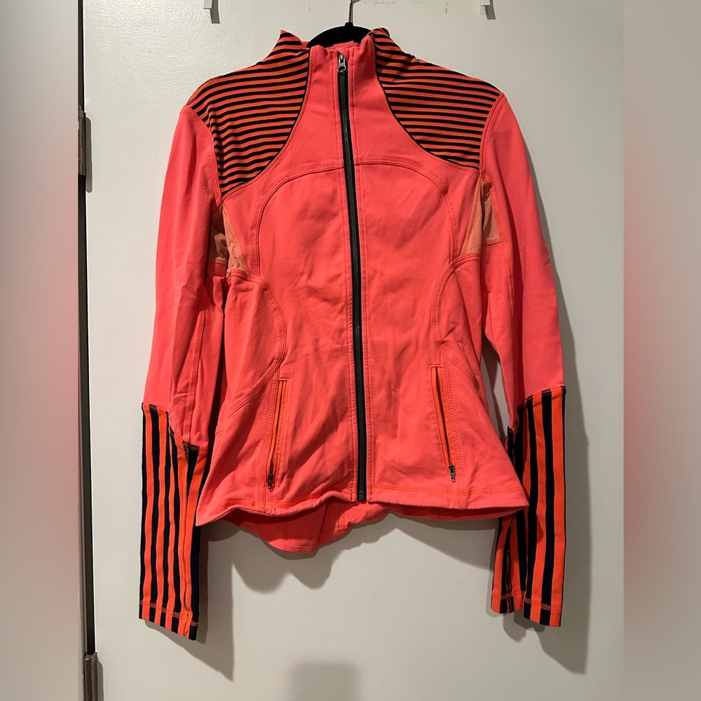 Lululemon Define Jacket in Neon Orange with Black Stripes, size 8